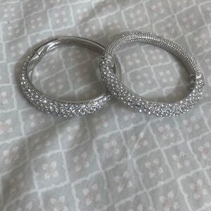 Silver paired bracelets that are in good condition!